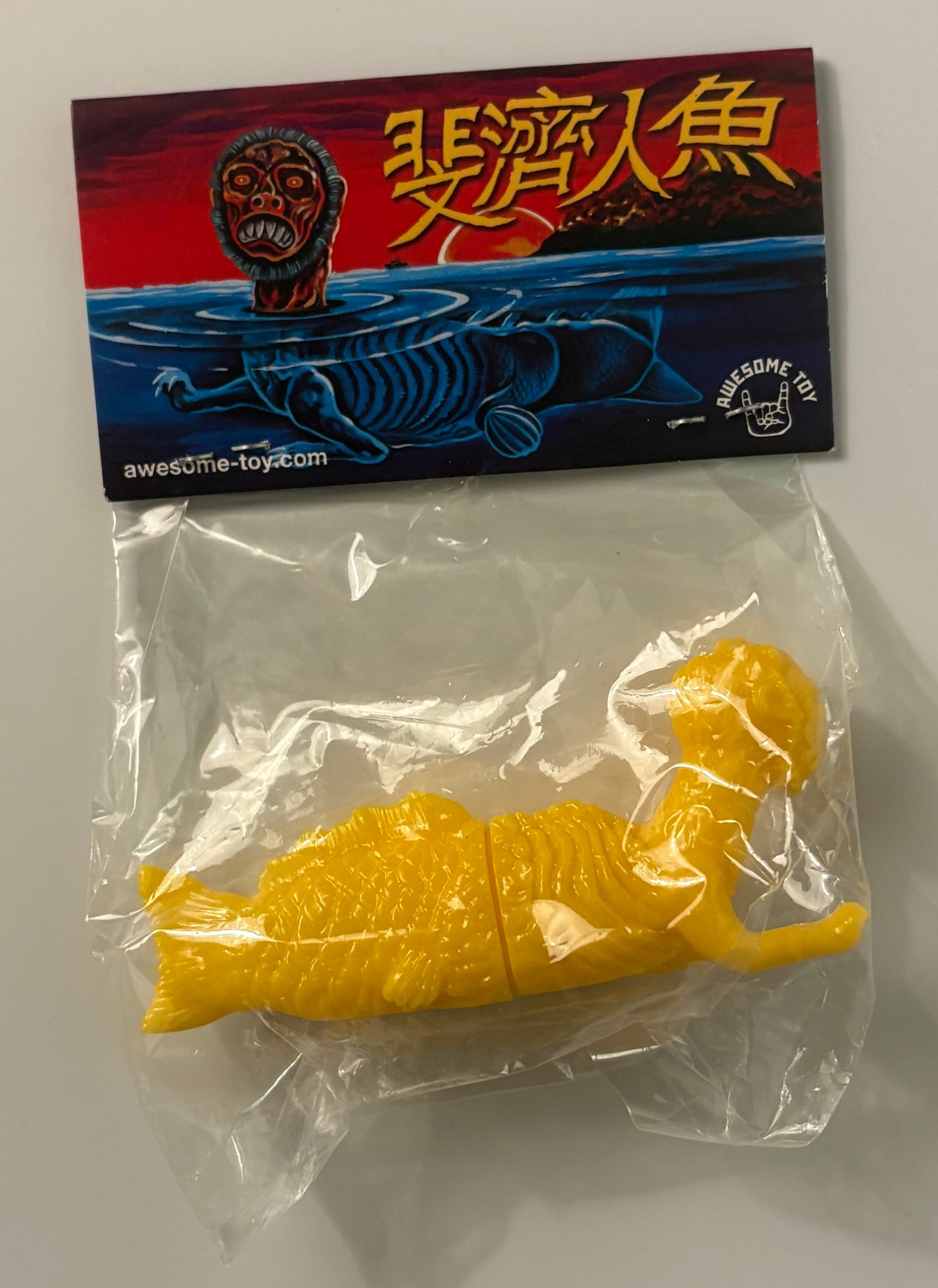 Ningen Sea Monster Vinyl Figure – Yellow & Black Variants (Bagged w/ Header, Awesome Toy)