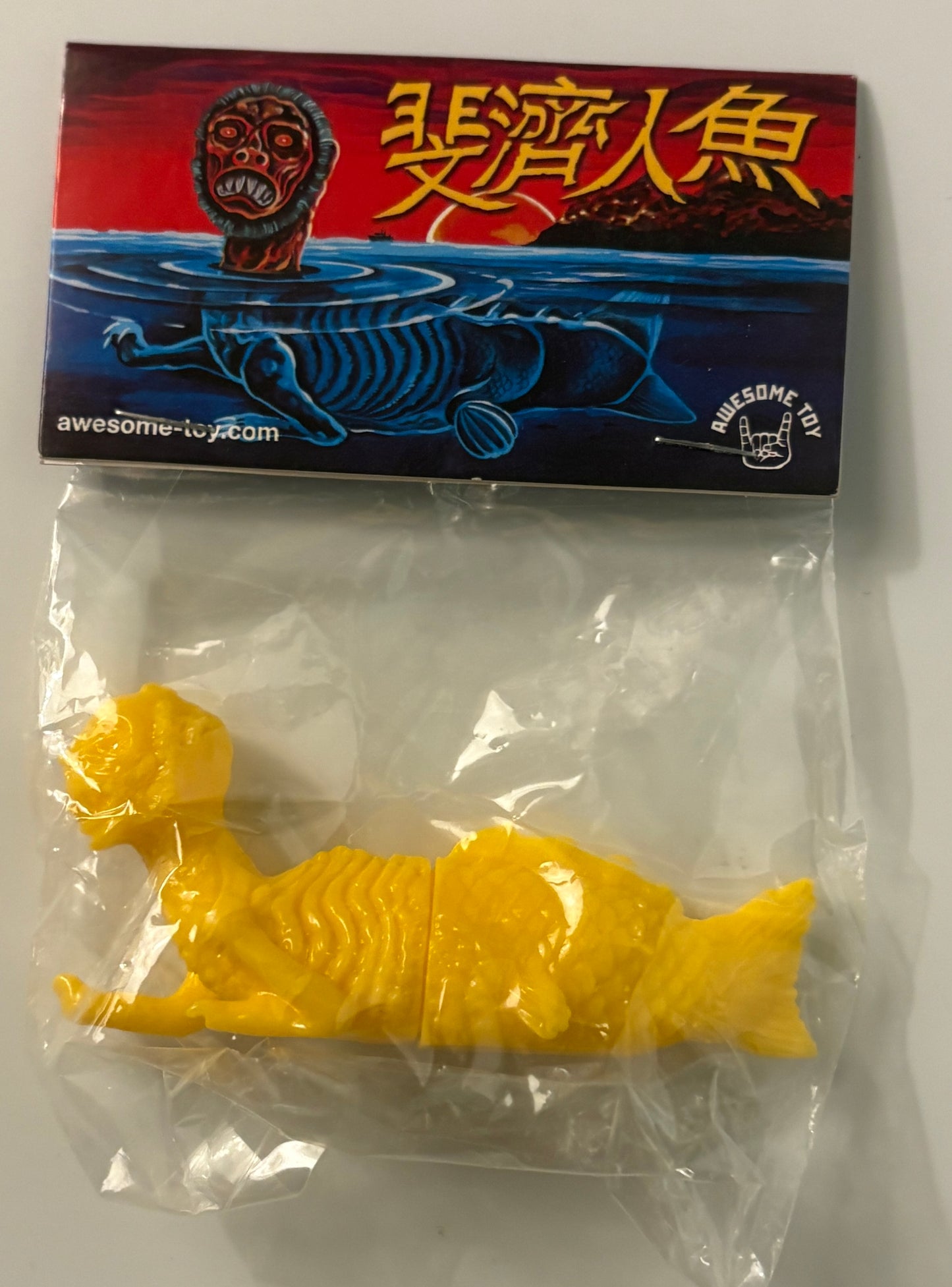 Ningen Sea Monster Vinyl Figure – Yellow & Black Variants (Bagged w/ Header, Awesome Toy)