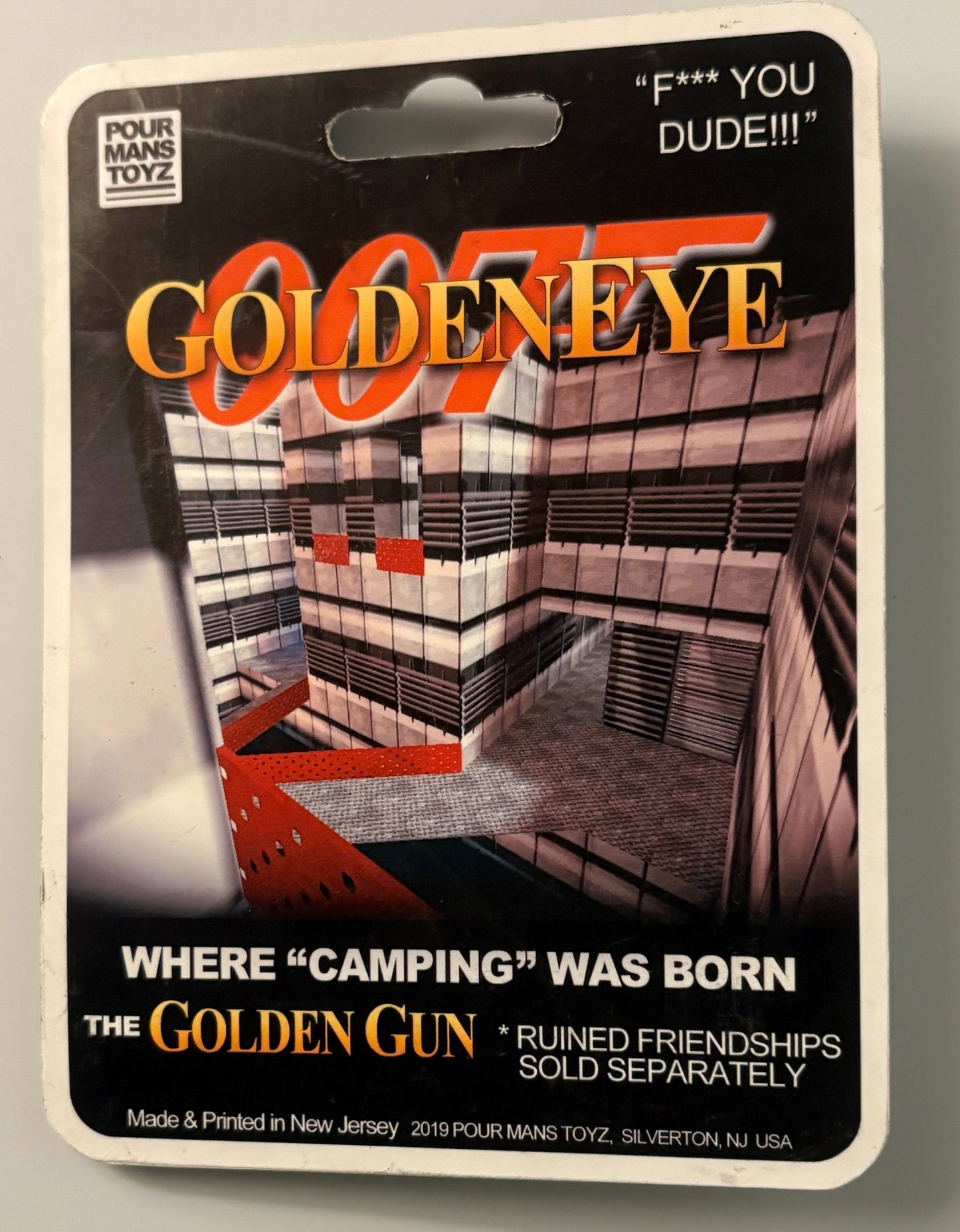 Golden Gun Parody Designer Toy – Retro FPS Gaming Collectible by Pour Mans Toyz