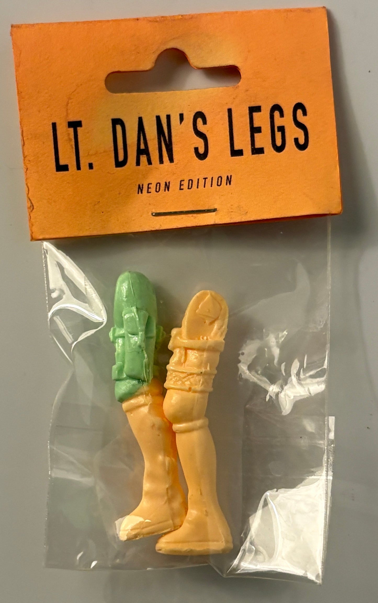 Lt. Dan’s Legs Neon Edition –  Brad Adams